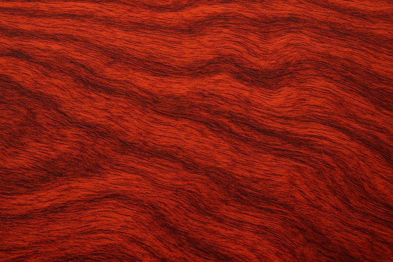 Bubinga wood slab with reddish waterfall grain