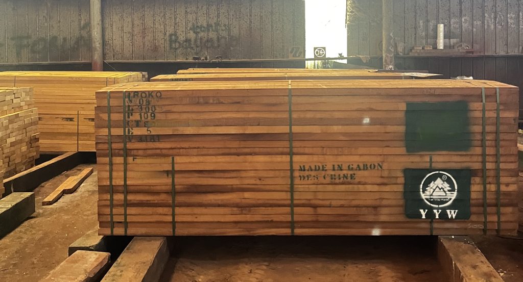 Kiln dried Iroko timber packed and stored in warehouse