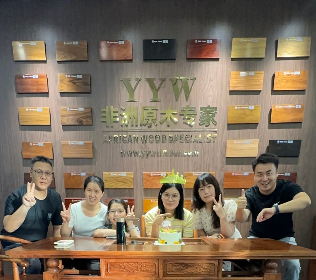 YYW Timber team celebrating employee birthday in new office