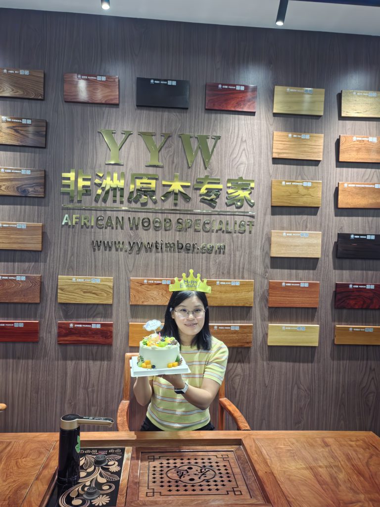 YYW Timber employee birthday celebration with cake